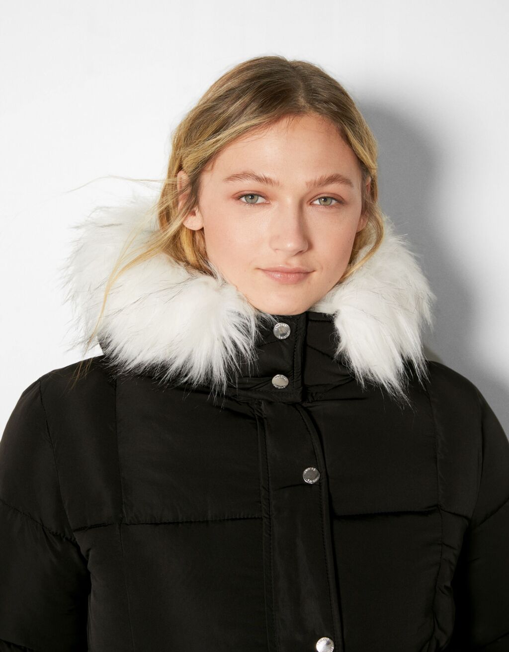 Puffer jacket with faux fur hood