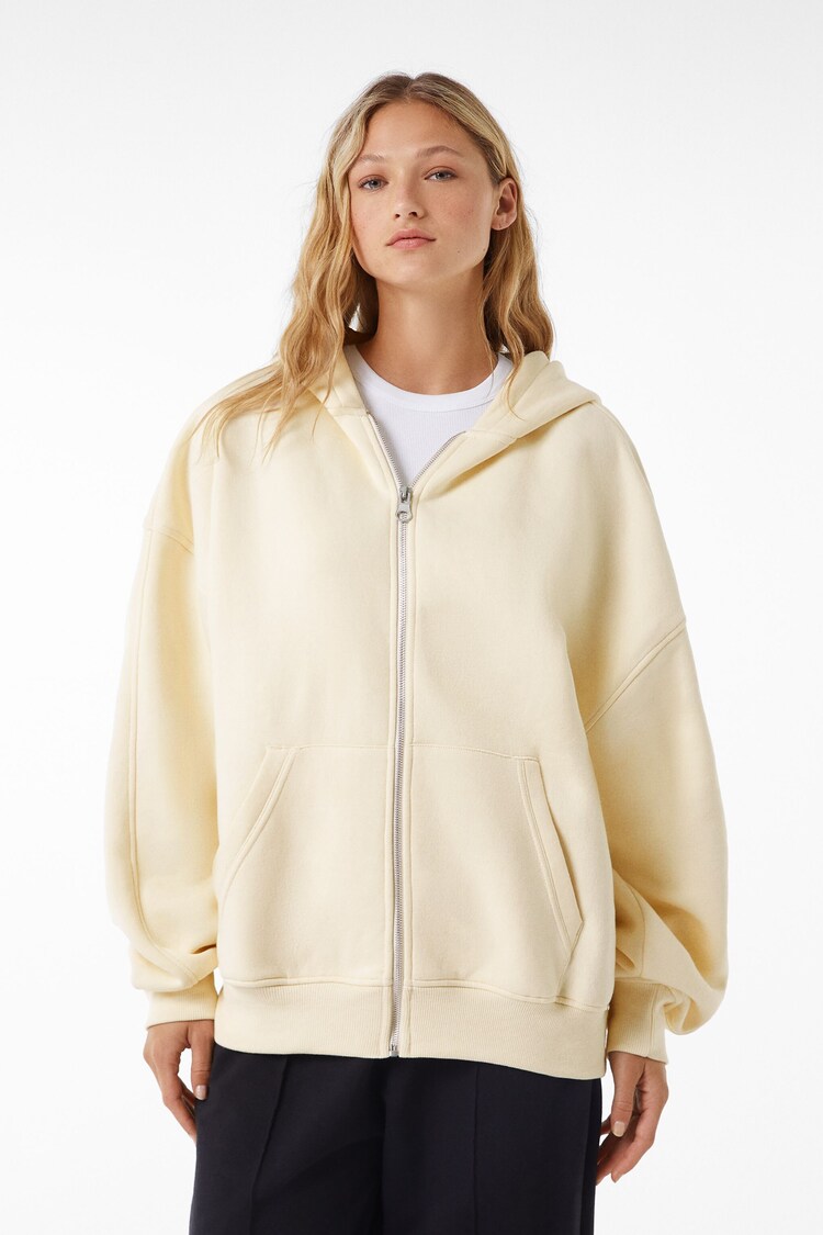‘Oversize’ stila plīša jaka ar kapuci