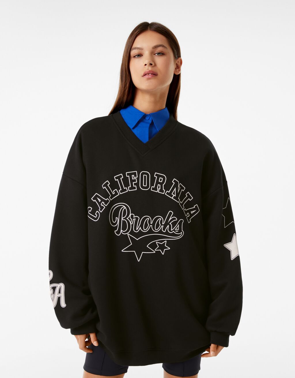 Oversized sweatshirt met print en V-hals