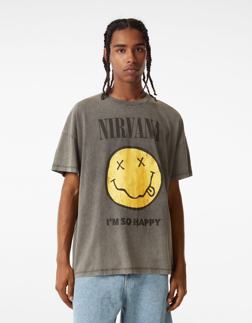 Koszulka z krótkim rękawem, nadrukiem zadowolonej buźki i napisem Nirvana