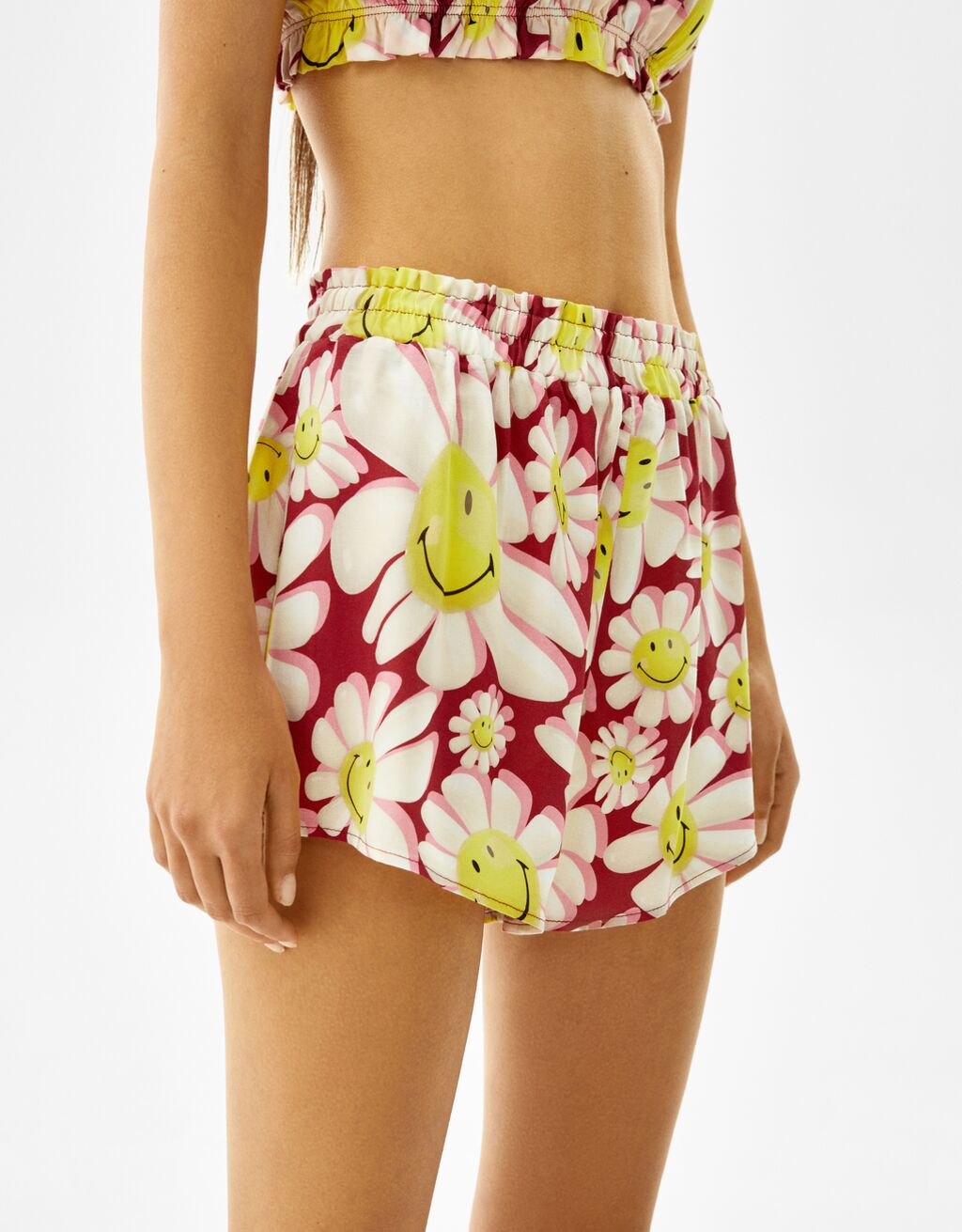 Shorts stampa Smiley® fiore