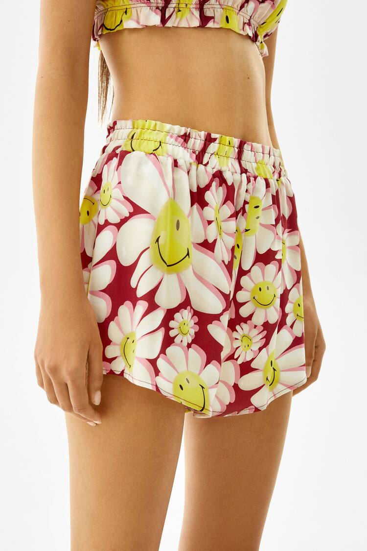 Shorts with Smiley® flower print