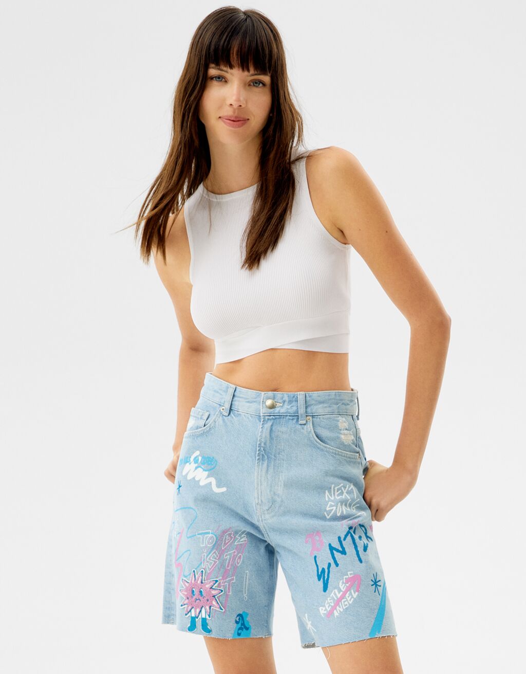 Printed denim shorts with patch