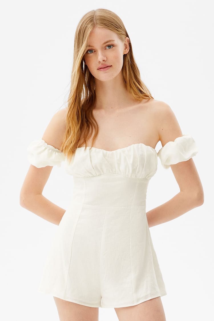 Short sleeve linen playsuit with gathered neckline.