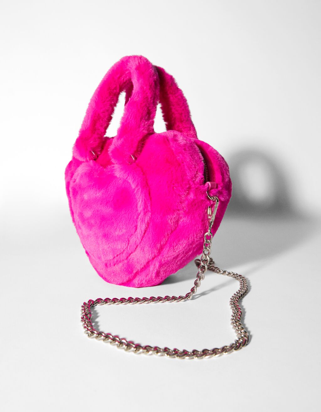 Faux fur heart crossbody bag with chain strap