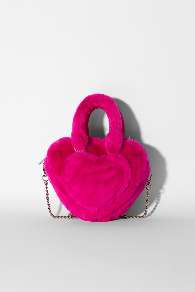 Širdelės formos dirbtinio kailio rankinukas su grandinėlės dirželiu