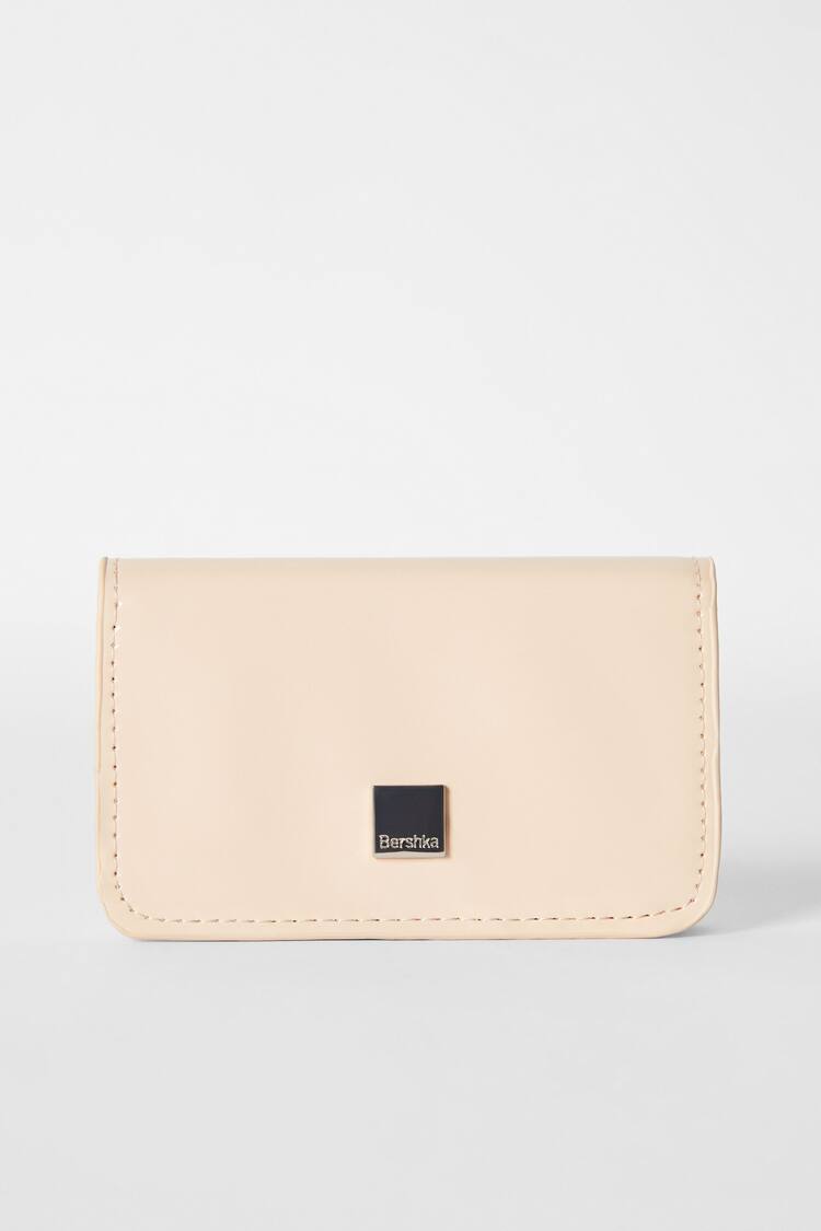 Smooth faux-patent-finish purse