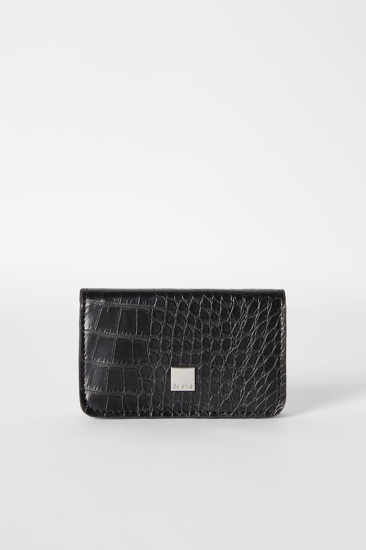 Smooth faux-patent-finish purse
