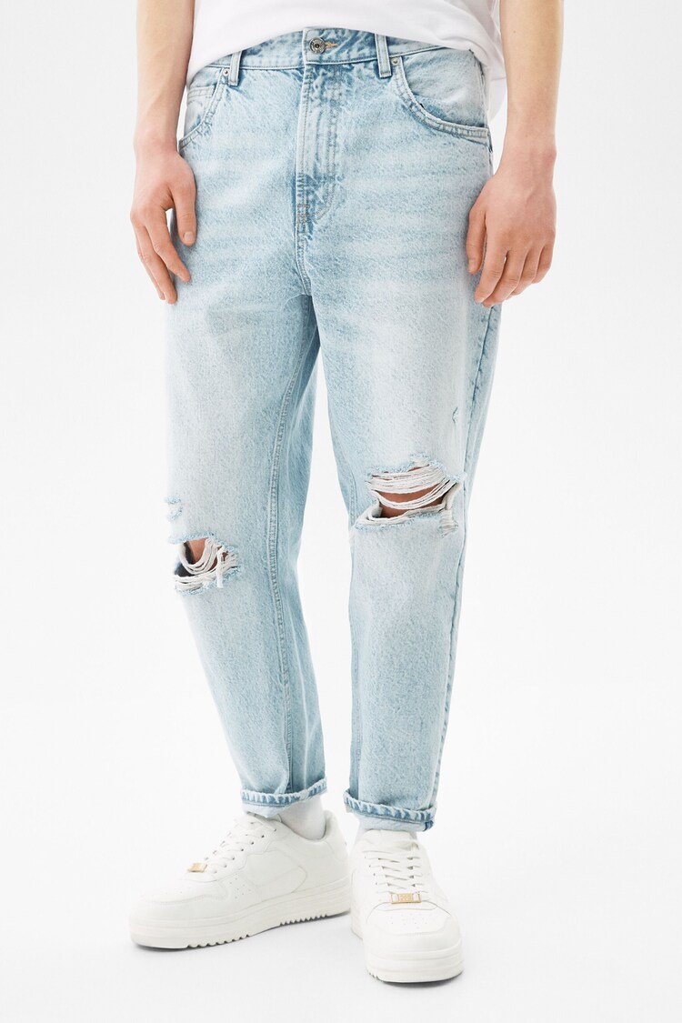 Ohlapne džins hlače s strganimi detajli