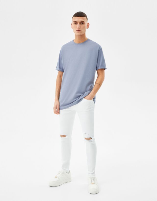 Jeans super skinny strappi - Uomo | Bershka