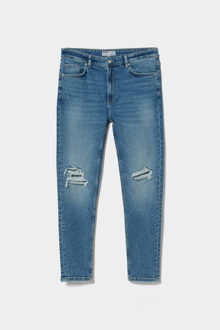 Jeans carrot com rasgões