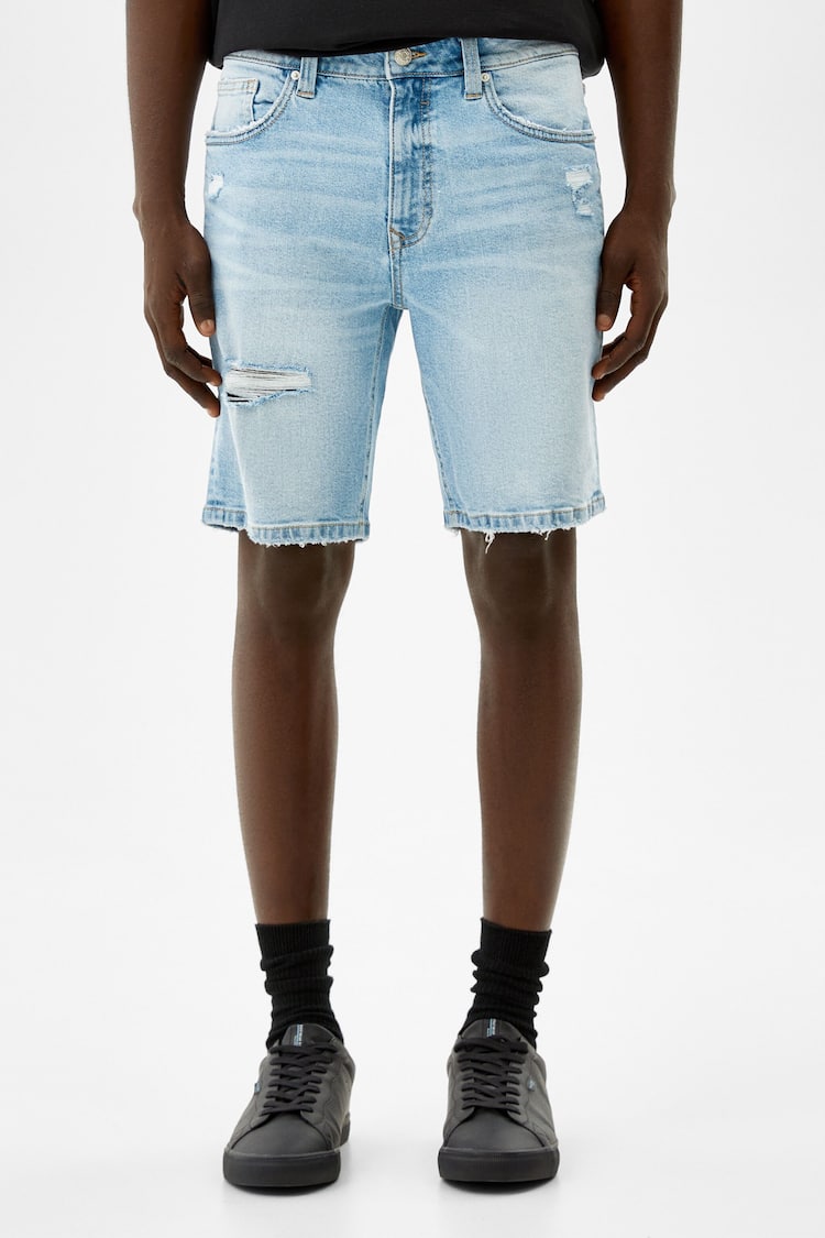 Skinny denim Bermuda shorts with rips