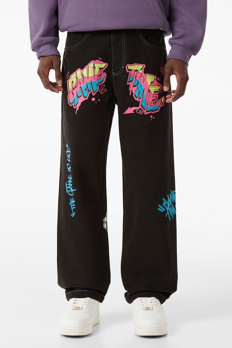 Graffiti print wide-leg trousers