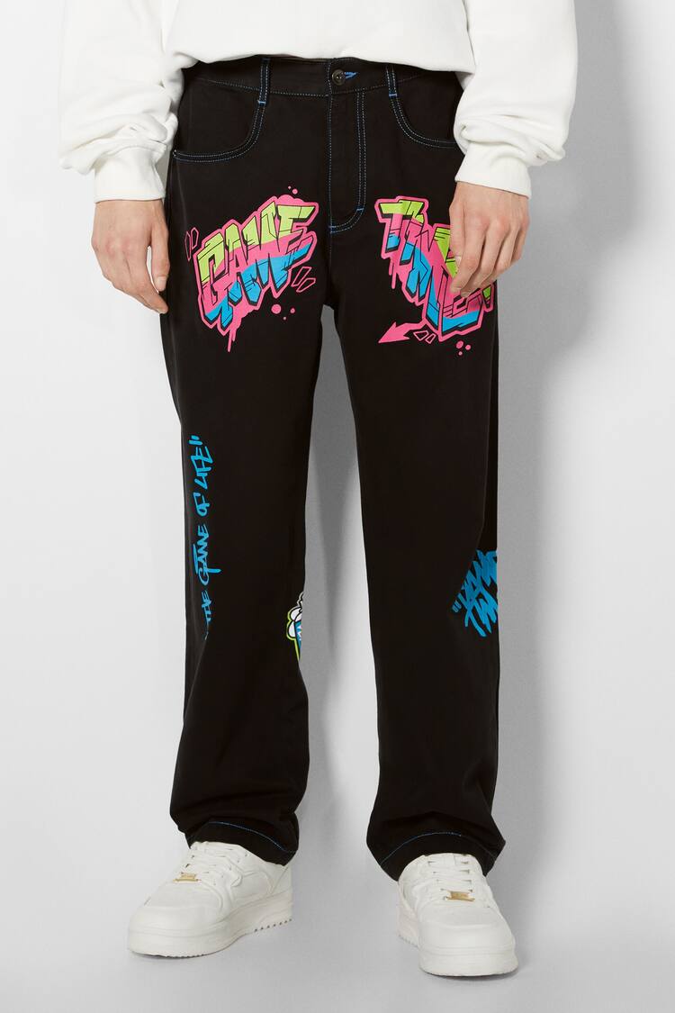 Graffiti print wide-leg trousers