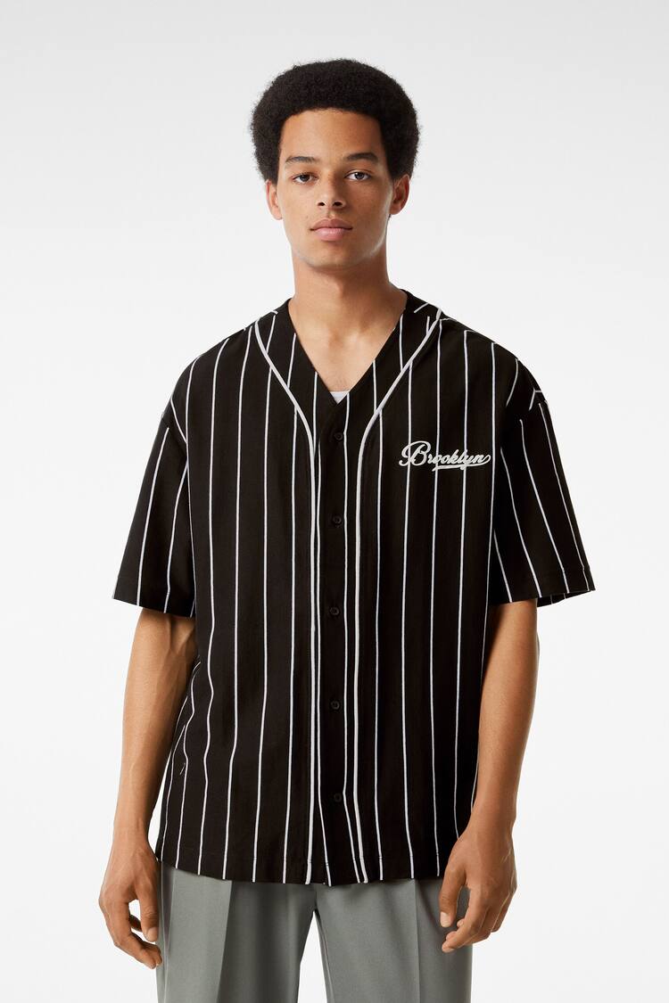 Camisa comprida manga beisebol