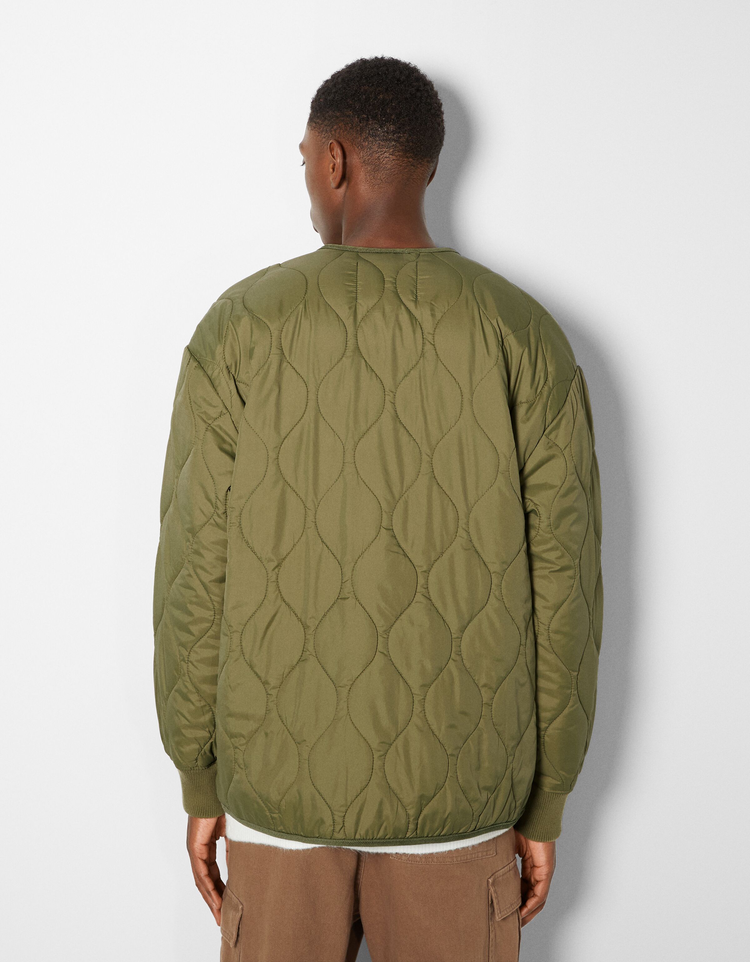 V-neck quilted jacket - Man | Bershka
