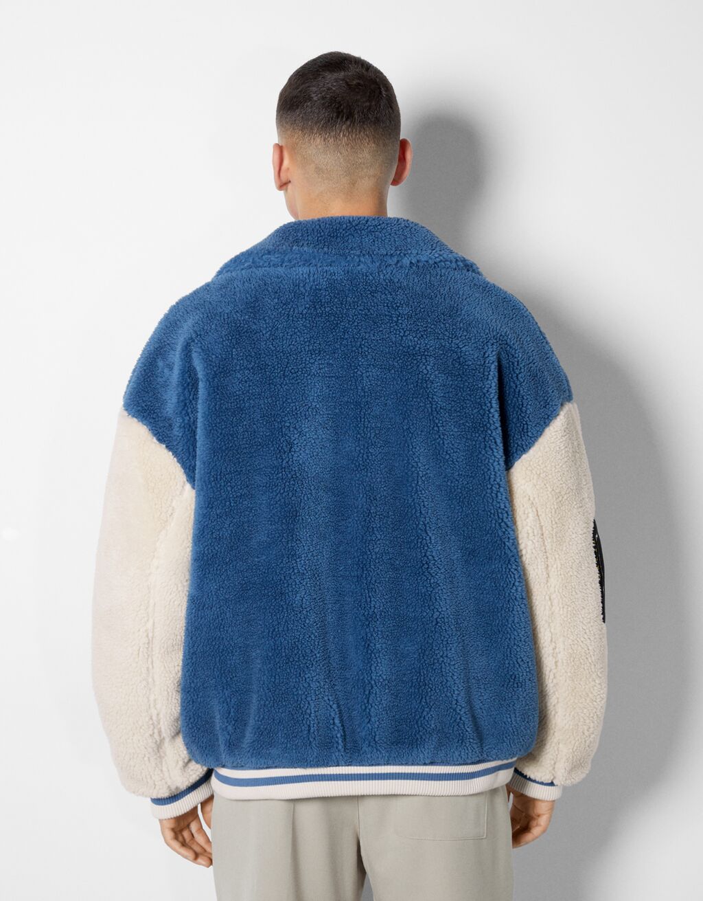 Faux shearling varsity bomber jacket Man Bershka