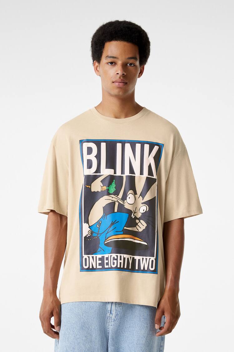 Bluzë e gjerë me mëngë të shkurtra dhe stampë "Blink 182"