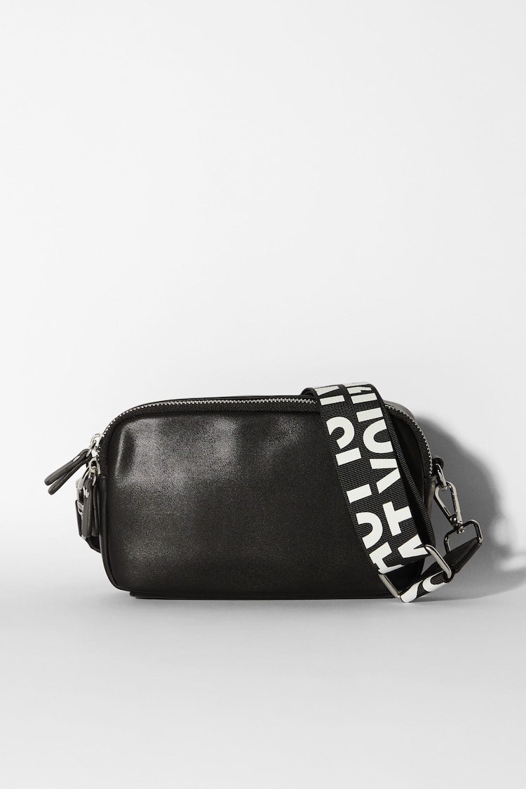 Crossbody bag with lettering strap