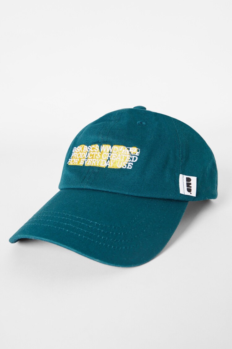 Cap with double embroidery