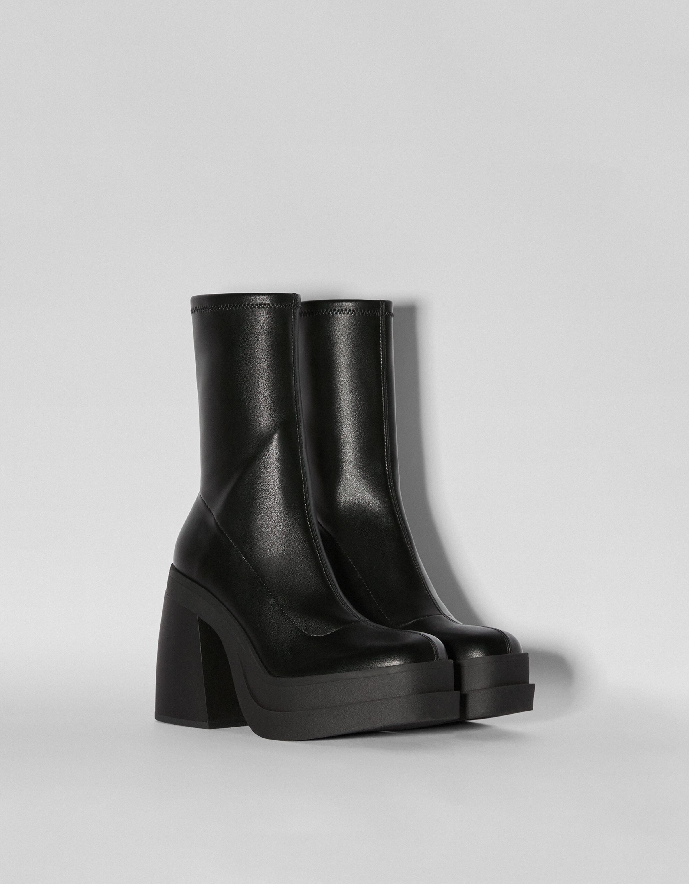 Fitted high-heel platform ankle boots 