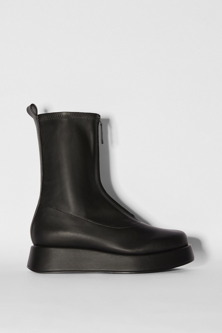 Platform ankle boots with front zip