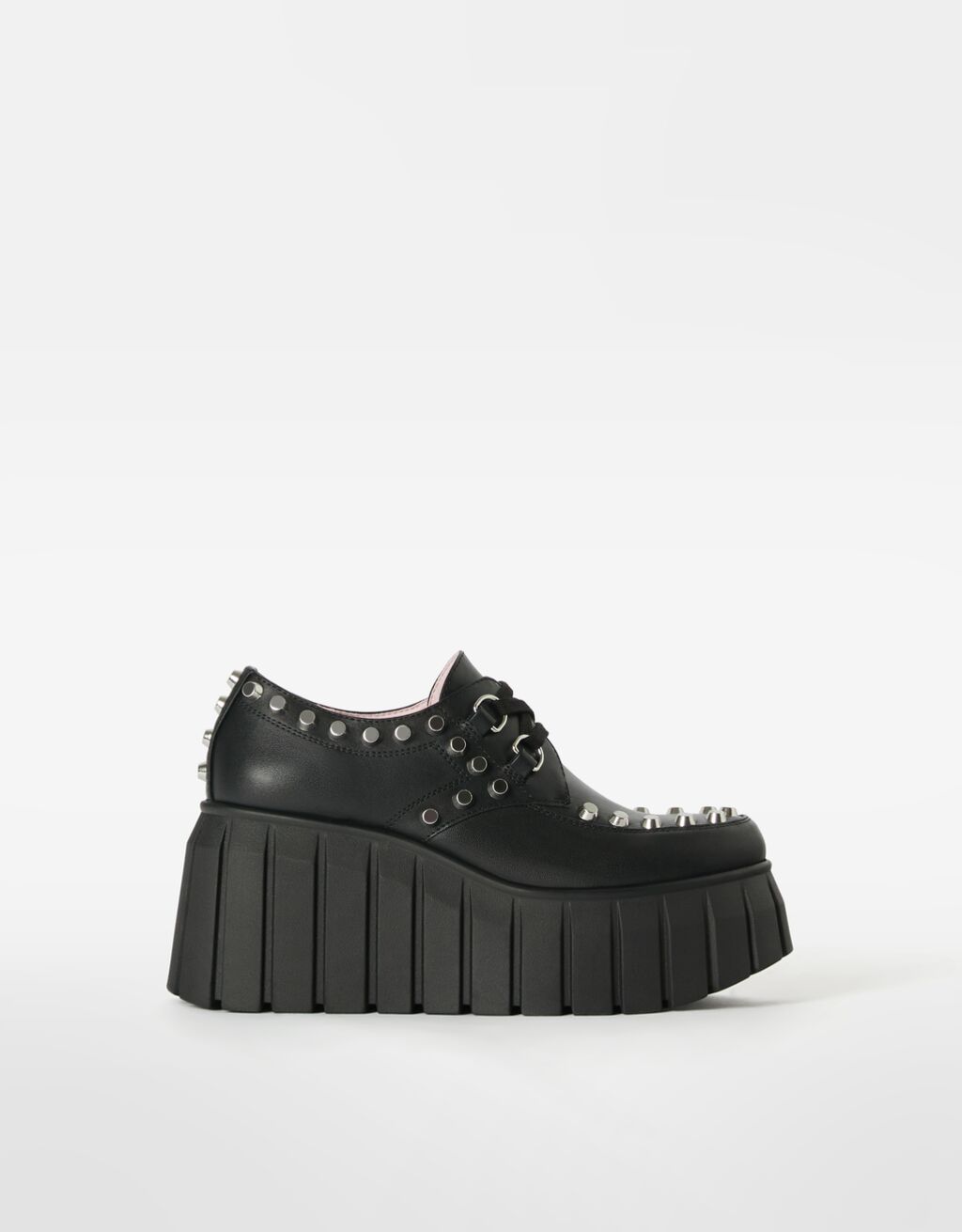 Lace-up platform shoes with studs