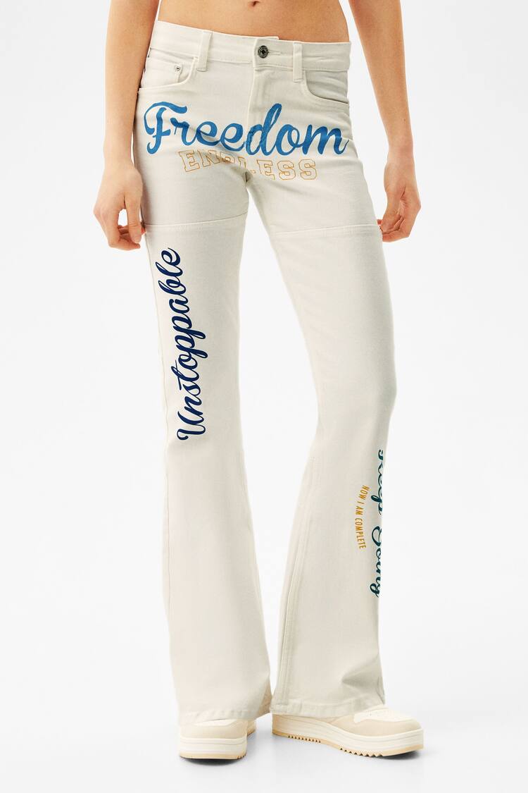 Flared twill printed trousers