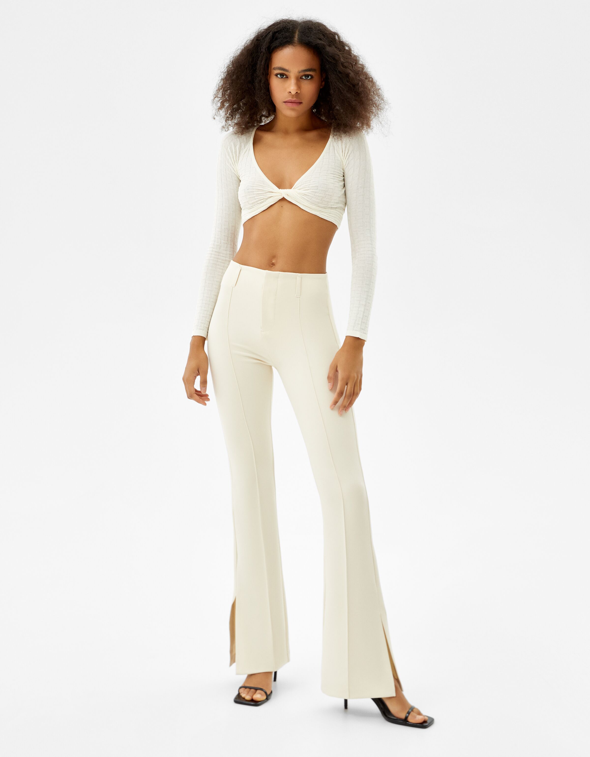 Flared split hem trousers - Woman | Bershka