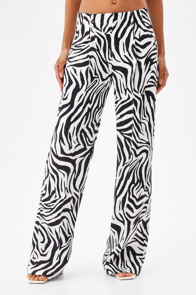 Satiny wide-leg animal print trousers