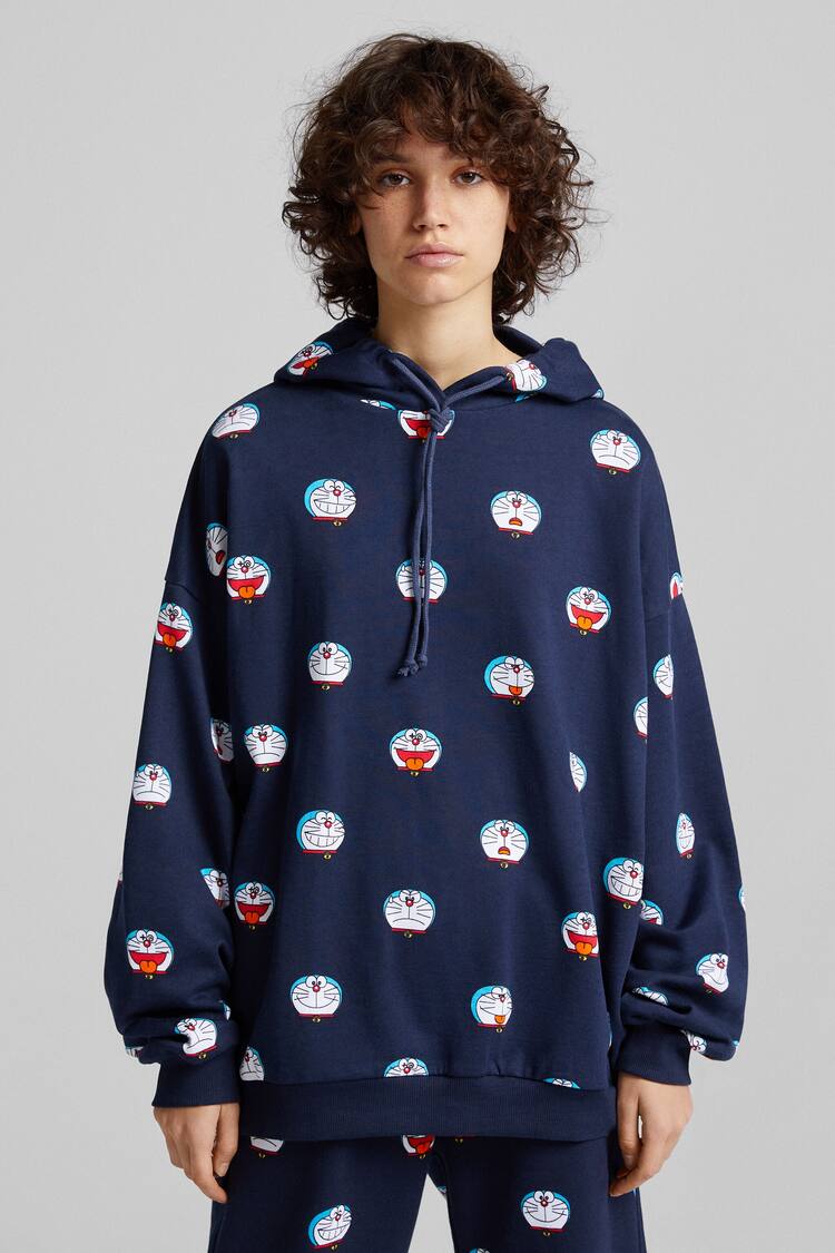 Hoodie with a DORAEMON print