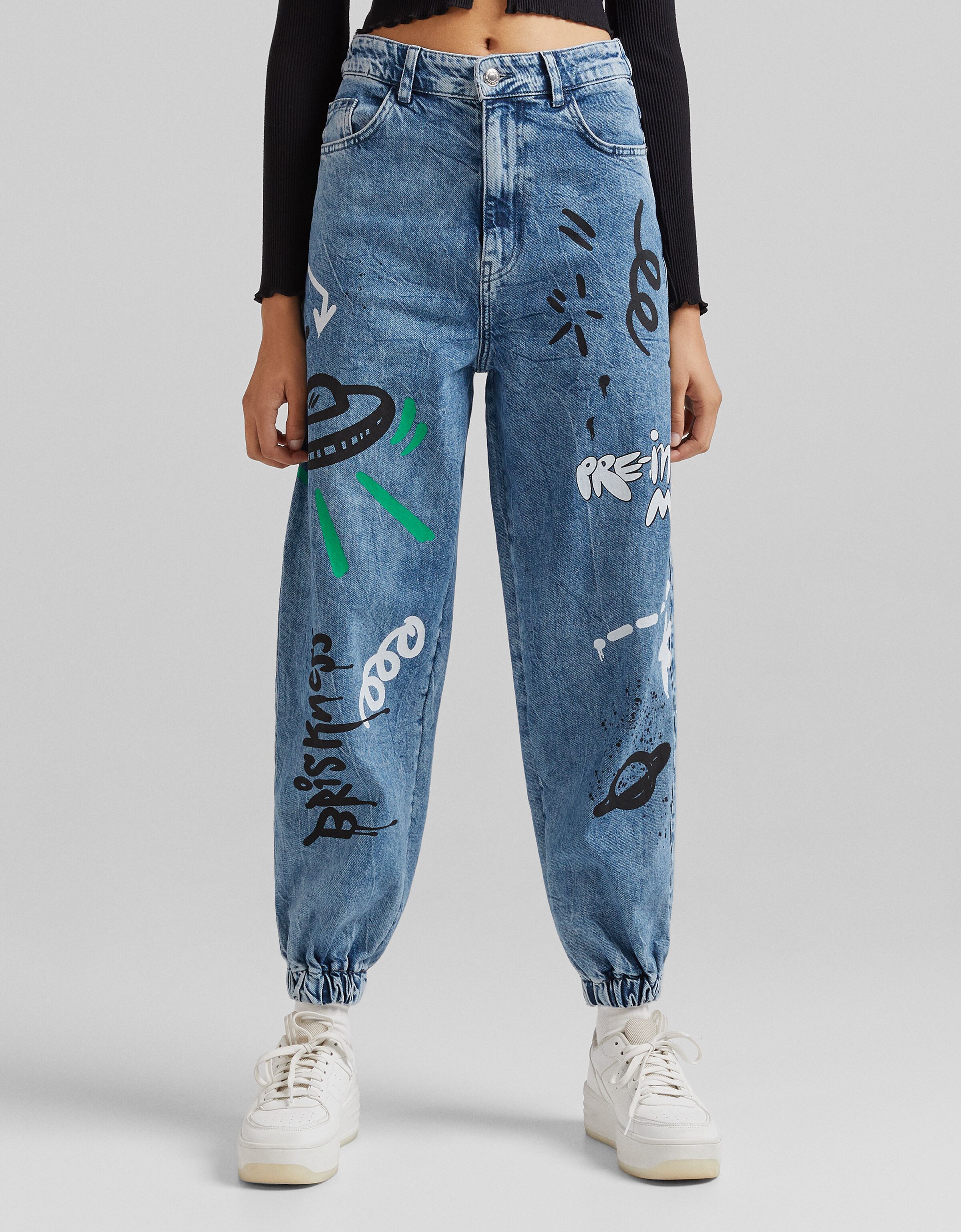 Graffiti print jogger jeans - Denim 