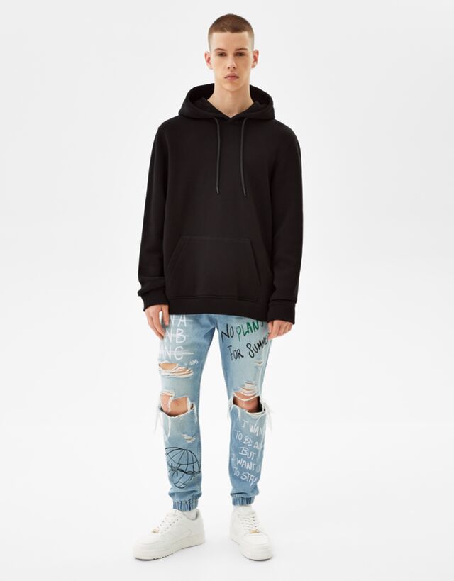 Jeans jogger rotos print - Hombre | Bershka