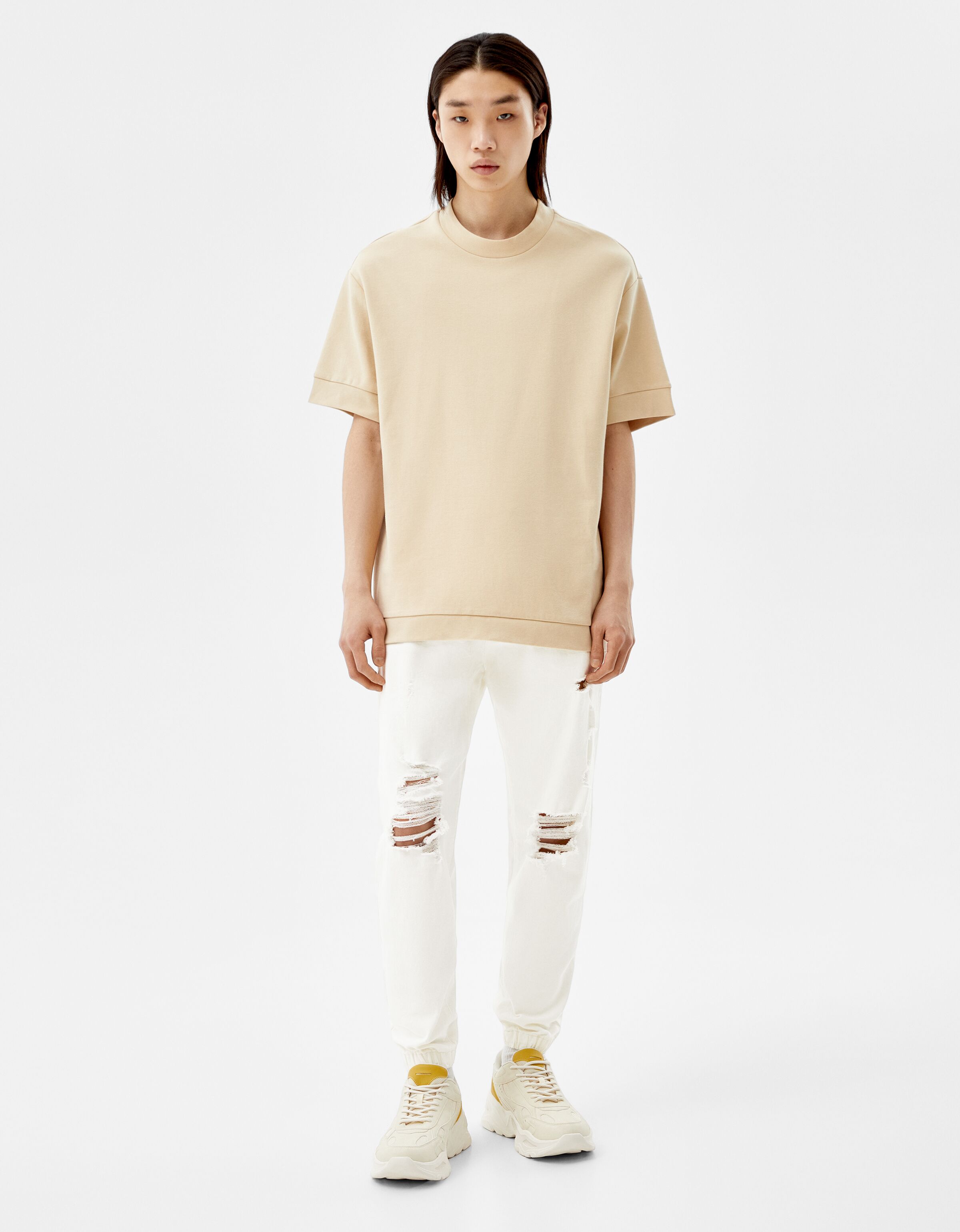 Jeans jogger rotos - Hombre | Bershka