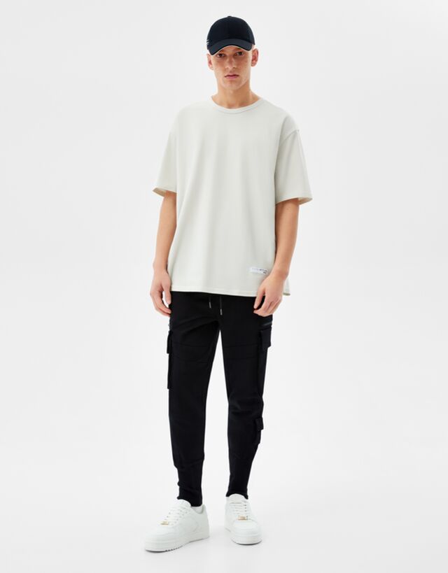 Pantaloni jogger multicargo a coste - Pantaloni - Uomo | Bershka
