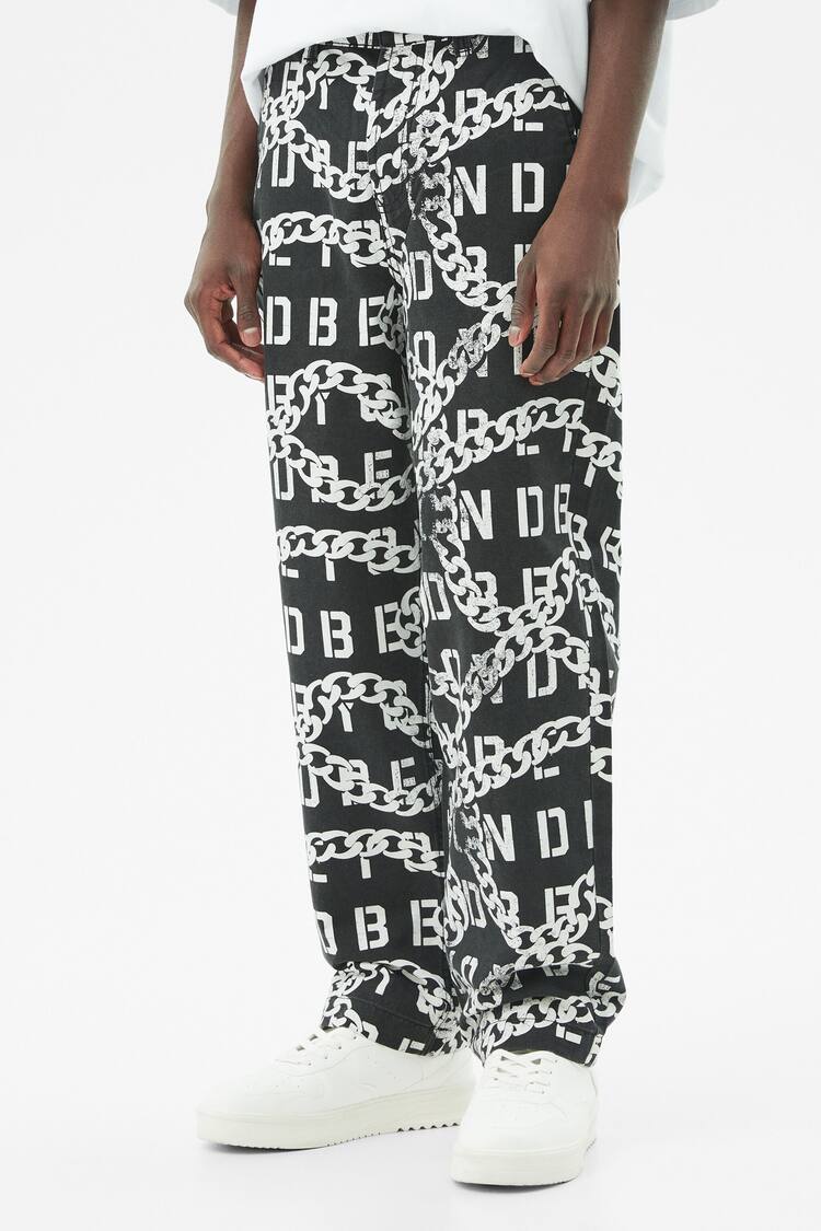 Wide-leg cotton trousers with chain print