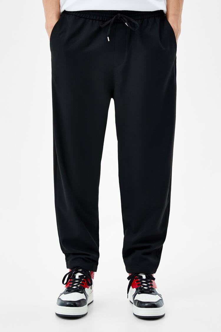 Loose twill tailored jogging trousers