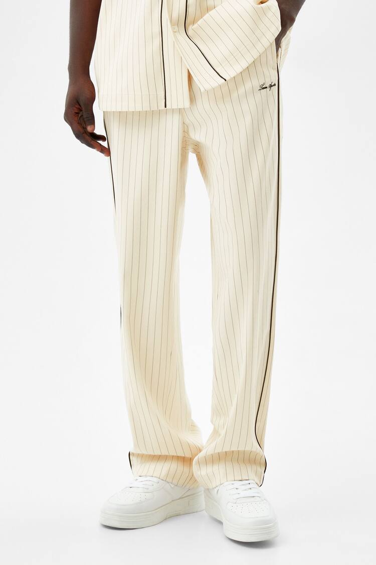 Wide pinstripe trousers