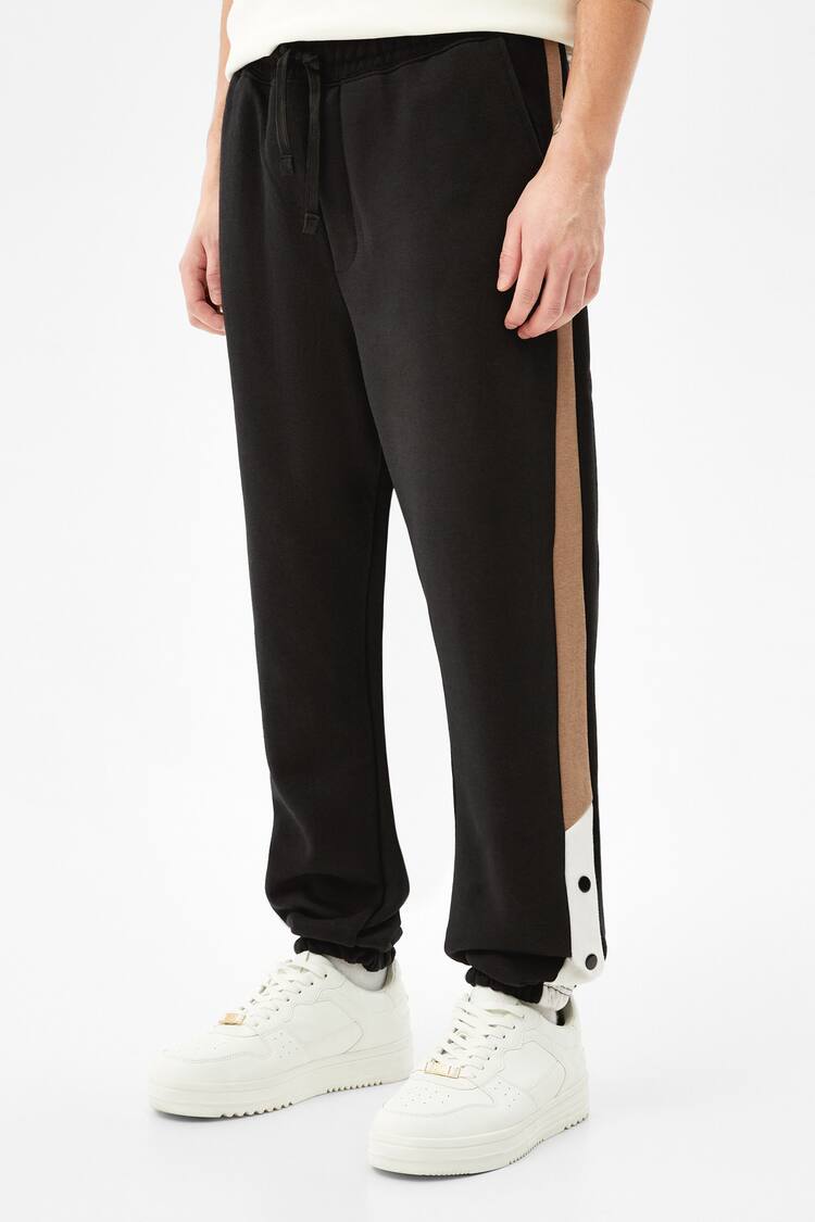 Joggers with snap buttons