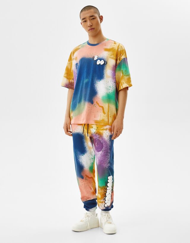 Veelkleurige sweatstof joggingbroek met spray-effect - Broeken - Heren |  Bershka