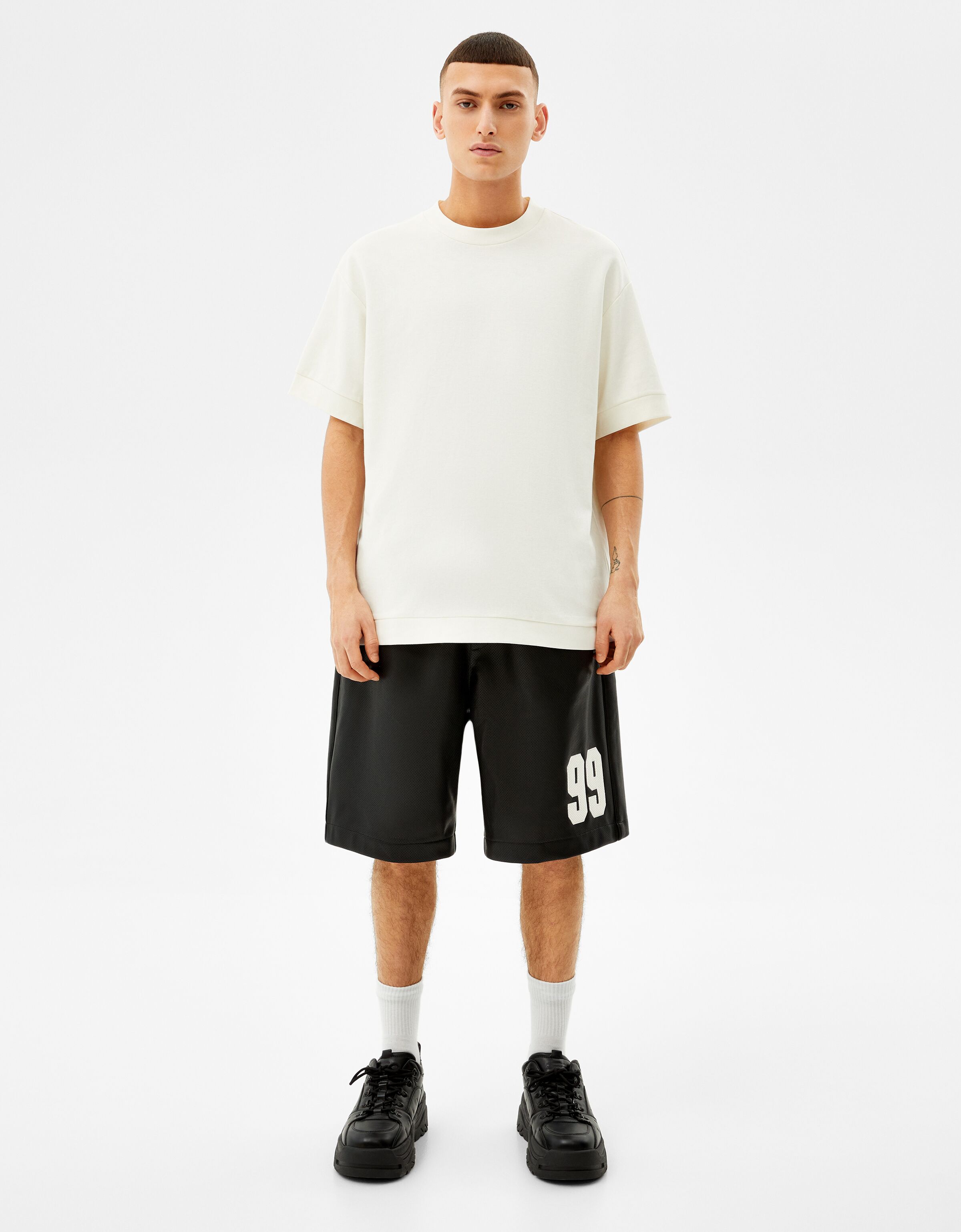 Faux leather printed Bermuda shorts 
