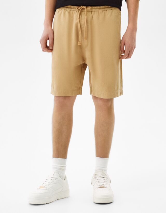Cotton Bermuda sweat shorts - Man | Bershka