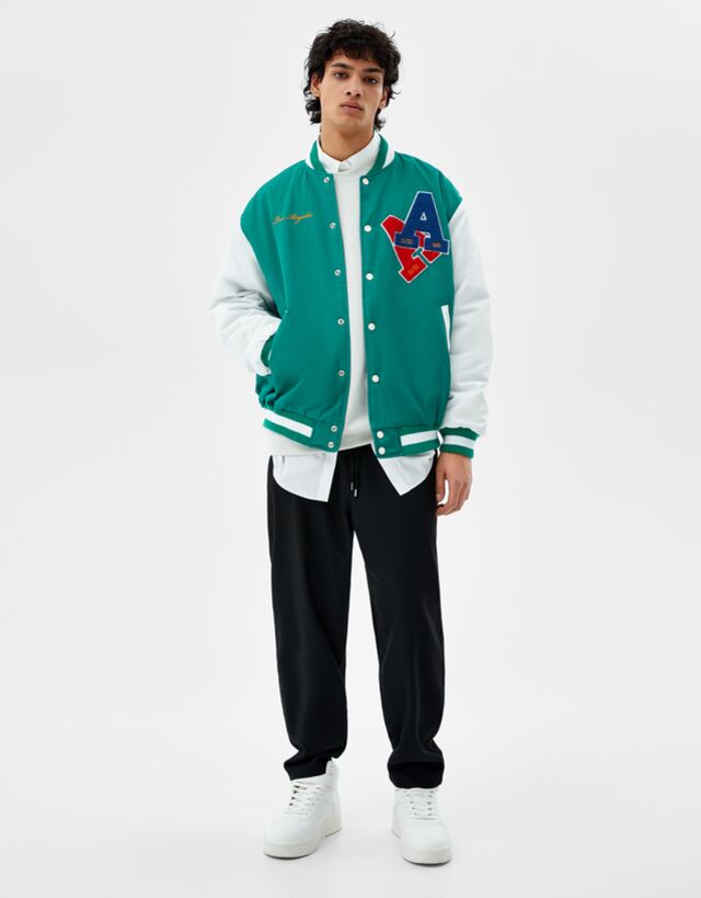 Bomber effetto nylon stile varsity con toppe - Giubbotti e cappotti - Uomo  | Bershka