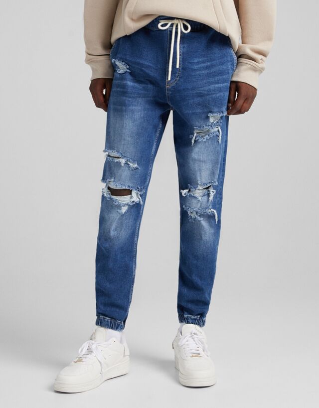 Jeans jogger rotos - Hombre | Bershka