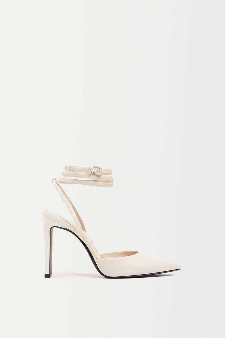 Shiny heeled slingback shoes
