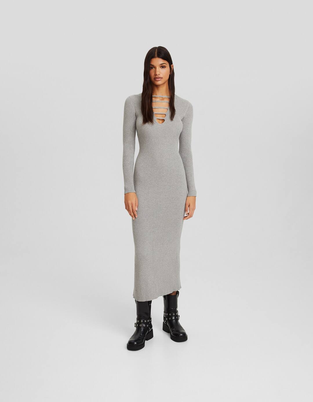 Long ribbed knit dress with long sleeves and plunging neckline