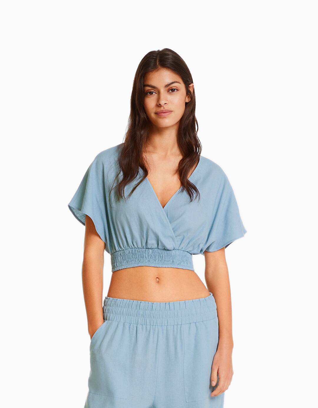 Short sleeve linen blend cropped blouse with crossover neckline
