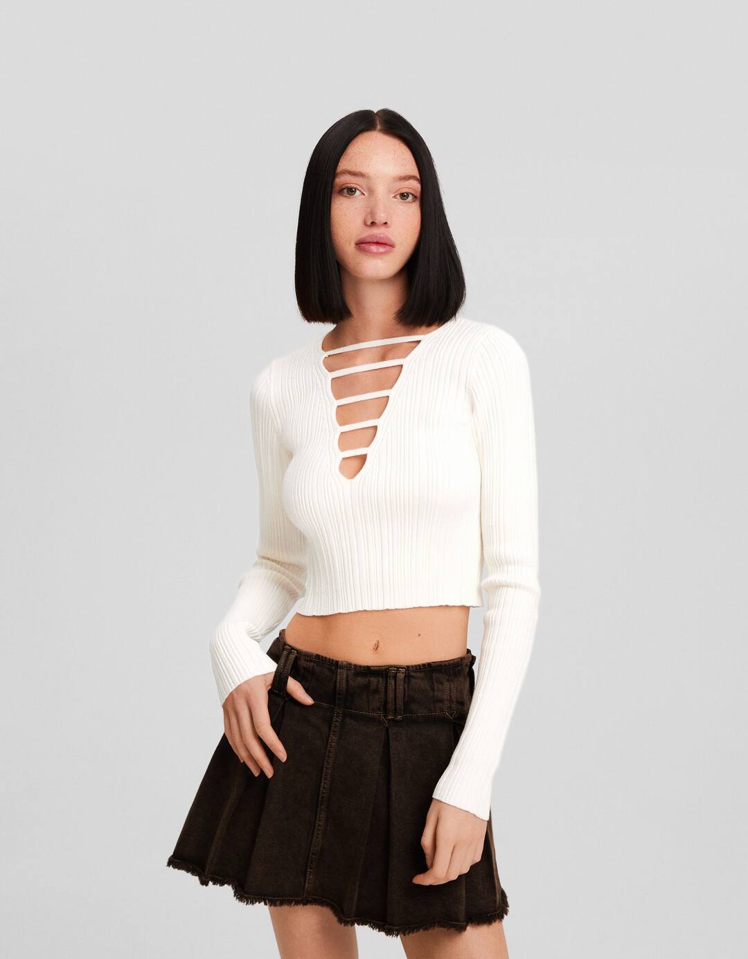 Ribbed knit sweater with plunging neckline and straps