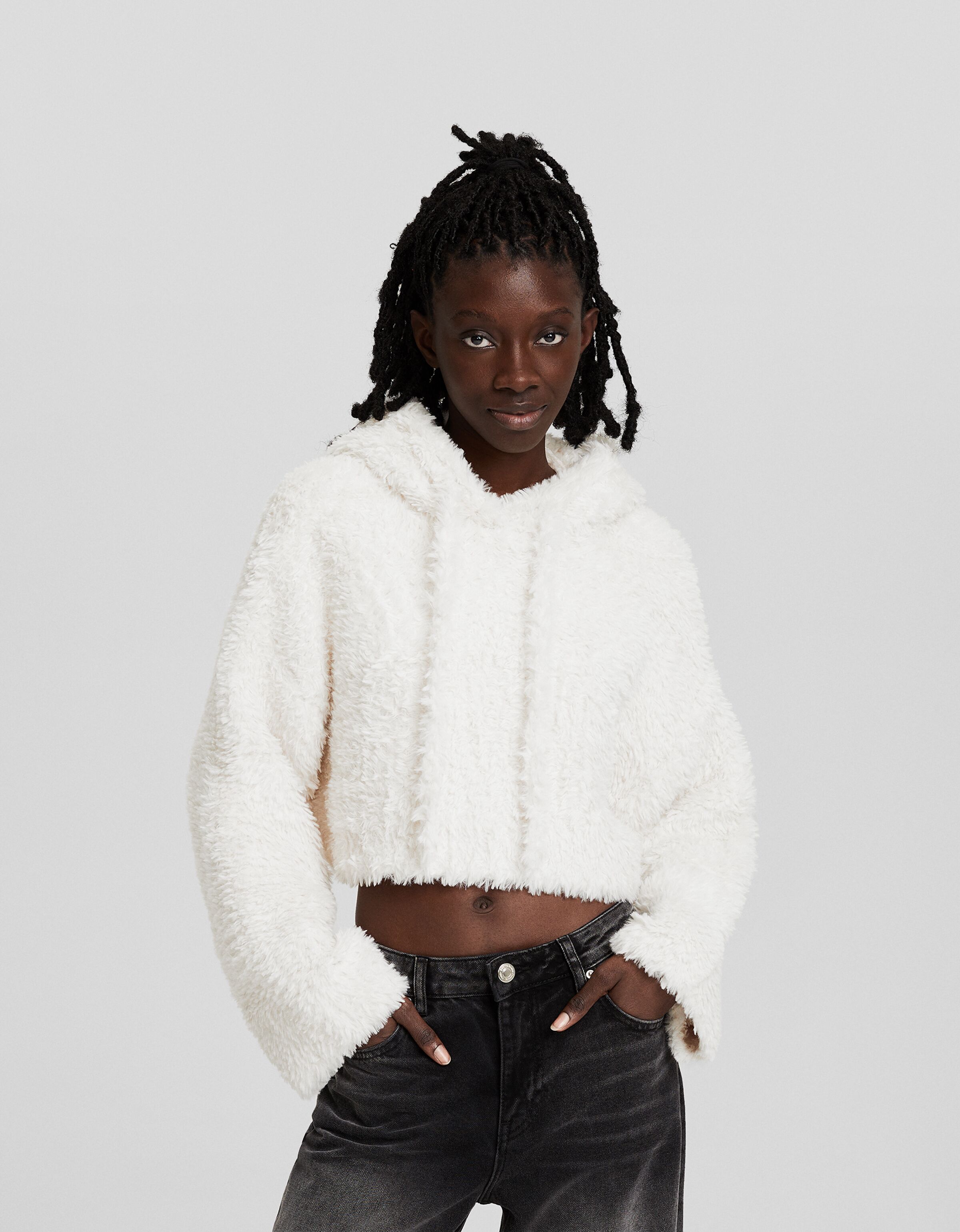 Faux fur hooded sweater Sweaters and cardigans BSK Teen Bershka