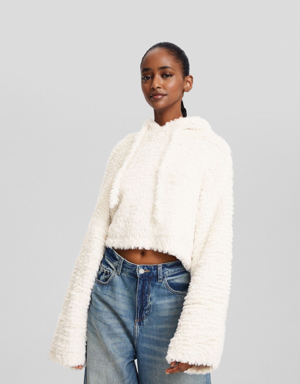 Sweater with shop fur hood